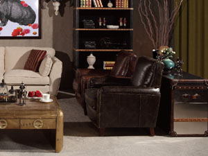 Camel Back Antique Black Leather Armchair